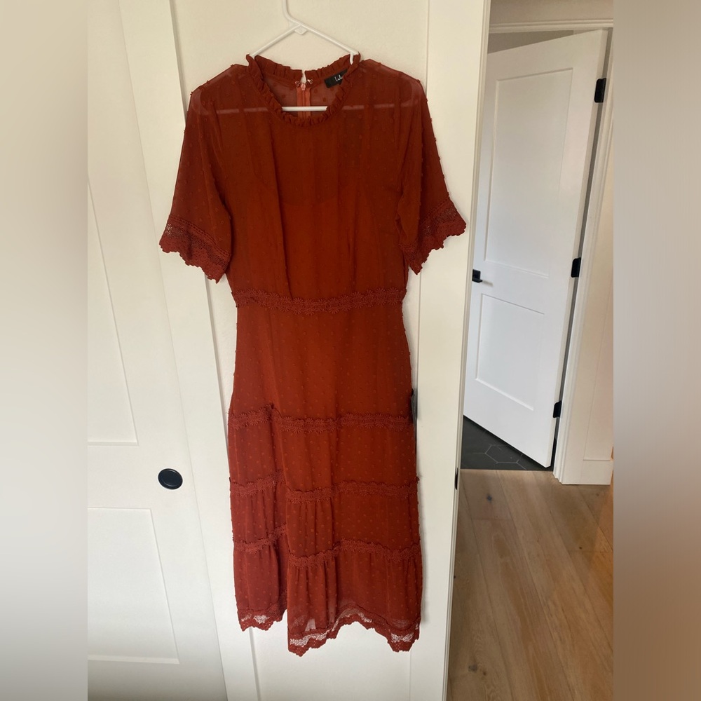 Beautiful orange/red dress perfect for fall photos